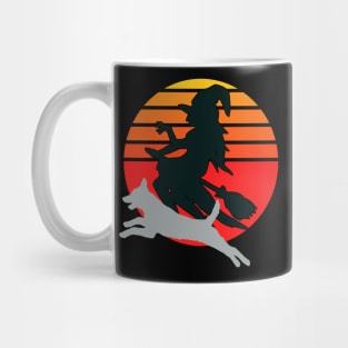 Witch and Malinois Riding Broom on Halloween Mug